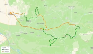 Kaart met wandelroutes in groen en transfers in oranje door de Luberon-regio in de Provence, Frankrijk. Legenda toont wandel- en transferroutes.