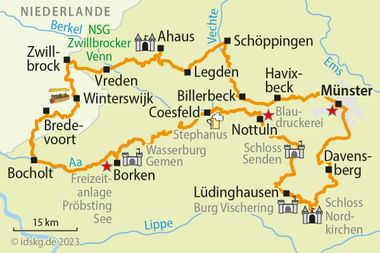 Fietskaart van de Münsterland-regio met oranje route die steden zoals Münster, Coesfeld, Borken en Winterswijk verbindt, kastelen gemarkeerd.