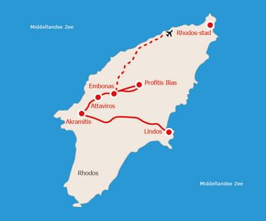 Kaart van Rhodos met wandelroute die Rhodos-stad, Profitis Ilias, Embonas, Attaviros, Akramitis en Lindos verbindt, rood gemarkeerd.