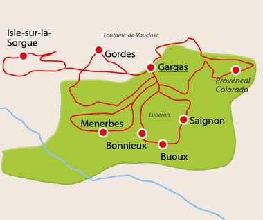 Kaart met fietsroutes in de Provence met rode lijnen die dorpen verbinden zoals Gordes, Gargas, Ménerbes, Bonnieux, Buoux en Saignon.