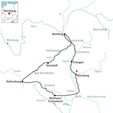Kaart met fietsroute door Beieren van Bamberg naar Neurenberg via Erlangen, Neustadt en Rothenburg, met rivieren en steden gemarkeerd.