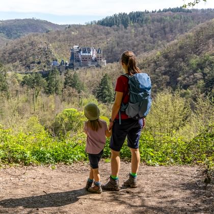 Two hikers enjoy the view along the Moselle