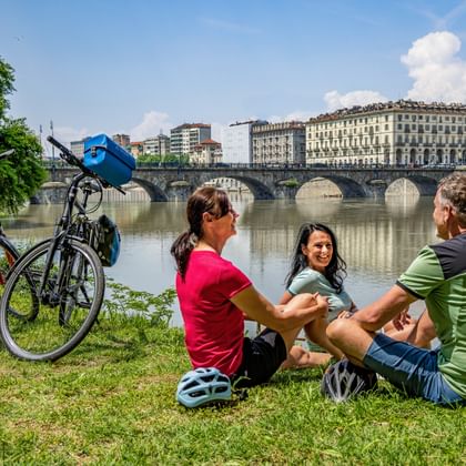 Cyclist on the banks of the Po in Turin