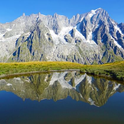 Mountain lake with view to the French Alps