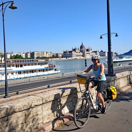 Cyclist in front of Budapest Parliament